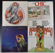 Approximately 30 albums, mostly charts from the 1980s