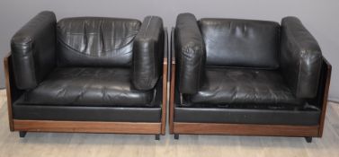 Pair of retro mid century Italian designer armchairs with hardwood frames and black leather