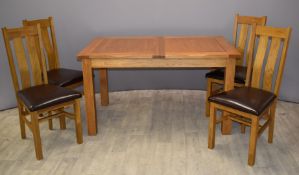 Contemporary solid oak extending dining table W140 x D90 x H77cm, when extended W170cm, with four