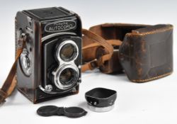 Minolta Autocord TLR camera with 75mm 1:3.5 lens, in leather case with lens cap and hood