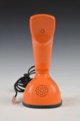 Ericsson LM retro orange 'Cobra' telephone with number dial wheel to base, height 21cm