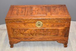 Oriental carved coffer or chest with brass clasp, W86 x D42 x H51cm