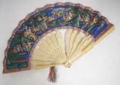 A 19thC Chinese carved bone fan with figural watercolour decoration, length of guard sticks 28cm