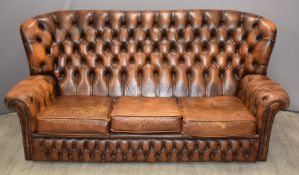 Chesterfield brown leather wing back three seat sofa