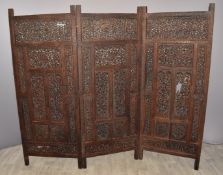 Oriental pierced / carved hardwood trifold screen, width extended 210cm x height 185cm