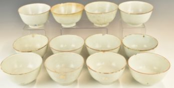 Twelve Chinese Kangxi period pedestal bowls with ivory / celadon glaze, from the Vung Tau Cargo,