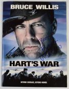 Two autographed programmes comprising Guys and Dolls signed by Patrick Swayze and Hart's War