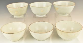 Six Chinese Kangxi period pedestal bowls with ivory / celadon glaze, from the Vung Tau Cargo, some