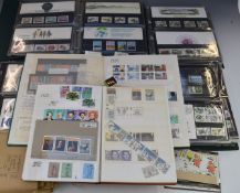 A large collection of GB presentation packs including duplicates, in albums, along with GB mint