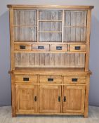 Contemporary solid oak dresser with seven drawers, cupboards and cubby holes, W140 x D42 x H191cm