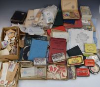 A quantity of world stamps and old catalogues in envelopes, on paper etc