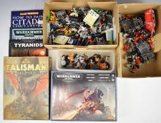 A collection of Warhammer and Warhammer 40k miniatures and books including Empire, High Elves,