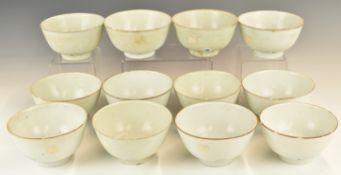 Twelve Chinese Kangxi period pedestal bowls with ivory / celadon glaze, from the Vung Tau Cargo,