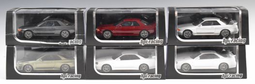 Six HPI Racing model Nissan Skyline slot cars 8501, 8503, 8505 x2, 8522 and 8530, all in original