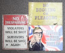 Three metal advertising signs 'No Trespassing violators will be shot survivors will be shot