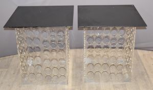 A pair of designer acrylic tables with marble effect tops inset with gold/silver flecks, W60 x D60 x
