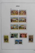 A mint collection of Channel Islands, Guernsey, Alderney, Jersey and Isle of Man in seven boxed Davo
