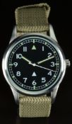 British RAF military style wristwatch with luminous hands and hour markers, white Arabic numerals,