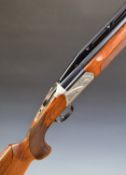 Fabarm Axis RS 12 12 bore over and under ejector shotgun with engraved locks, underside and top