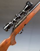 Tikka M595 .223 bolt-action rifle with chequered semi-pistol grip and forend, sling, sound