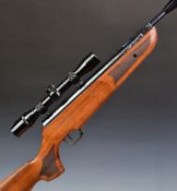 Theoben .22 air rifle with chequered semi-pistol grip and forend, sound moderator and 4x32 wide