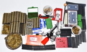 A large collection of re-loading equipment including Lee press, enmpty brass cartridge cases,