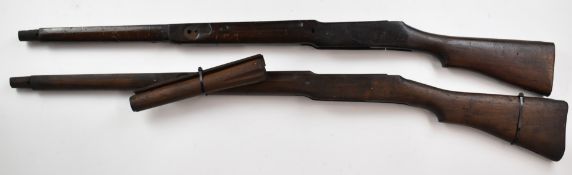 Two Enfield P14 bolt-action rifle stocks, 105cm and 108cm long.