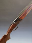 Baikal 12 bore over and under ejector shotgun with engraved scenes of birds to the locks, engraved