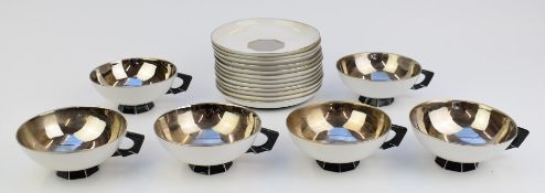 Fifteen pieces of Sèvres Art Deco style cups and saucers with silvered interior