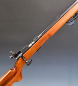 BRNO Model 4 .22 bolt-action target rifle with semi-pistol grip, bipod, multi-shot magazine, sling