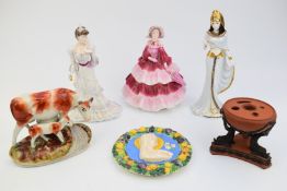 Three Coalport figurines including Cleopatra, Wedgwood terracotta, Staffordshire cow and calf, an