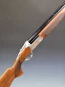 Reximex RMX-1 12 bore over and under ejector shotgun with engraved locks, underside, trigger guard