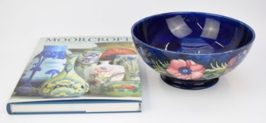Moorcroft pedestal bowl decorated in the Anemone pattern, with signature to base, diameter 24 x