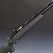 FX T12 .177 PCP air rifle with semi-pistol grip, raised cheek piece and multi-shot magazine,