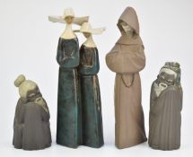 Four Lladro figures including nuns and monks