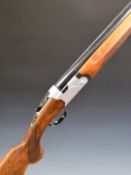 Beretta S685E 12 bore over and under ejector shotgun with engraved lock, underside, trigger guard,