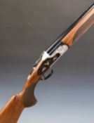 Huglu 103 FE 20 bore over and under ejector shotgun with engraved and gilt scenes of birds to the