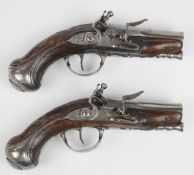 A pair of French flintlock pocket pistols, each with lock signed 'Clerts a Paris', engraved lock,