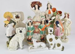 Collection of Staffordshire figures including poodle together with Continental figurine with fan