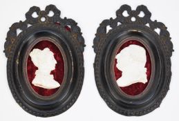 Pair of 19thC Sèvres porcelain plaques of Louis XVI and Marie Antoinette in carved wooden frames,