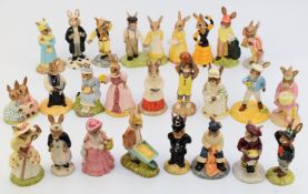 Twenty six Royal Doulton Bunnykins boxed figures including Father (figure of the year), Punch, Judy,