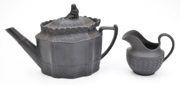 19thC black basalt Castleford teapot with Madonna and child finial and a creamer, probably Wedgwood,