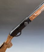 Escort Magnum 20 bore semi-automatic shotgun with composite faux wood stock, chequered semi-pistol