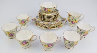 Twenty one pieces of Royal Albert tea ware including cake plate decorated in a floral chintz