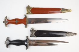 Two replica German WW2 Nazi Third Reich daggers, both with 22cm double edged blade and sheath PLEASE