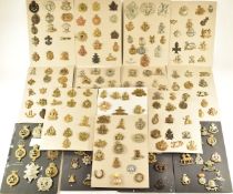 Large collection of British and Commonwealth cap badges including County of London Paddington