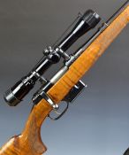 CZ 527-2 .223 bolt-action rifle with chequered semi-pistol grip and forend, raised cheek-piece,