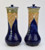 Pair of Royal Doulton Art Nouveau covered pedestal vases with incised monogram to base for Ethel