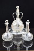 Ten glass decanters some 19thC with etched decoration of sailing ships, windmills, swallows, fruit