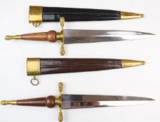 Two replica plug bayonets, both with double edged 24cm blades and sheaths PLEASE NOTE ALL BLADED
